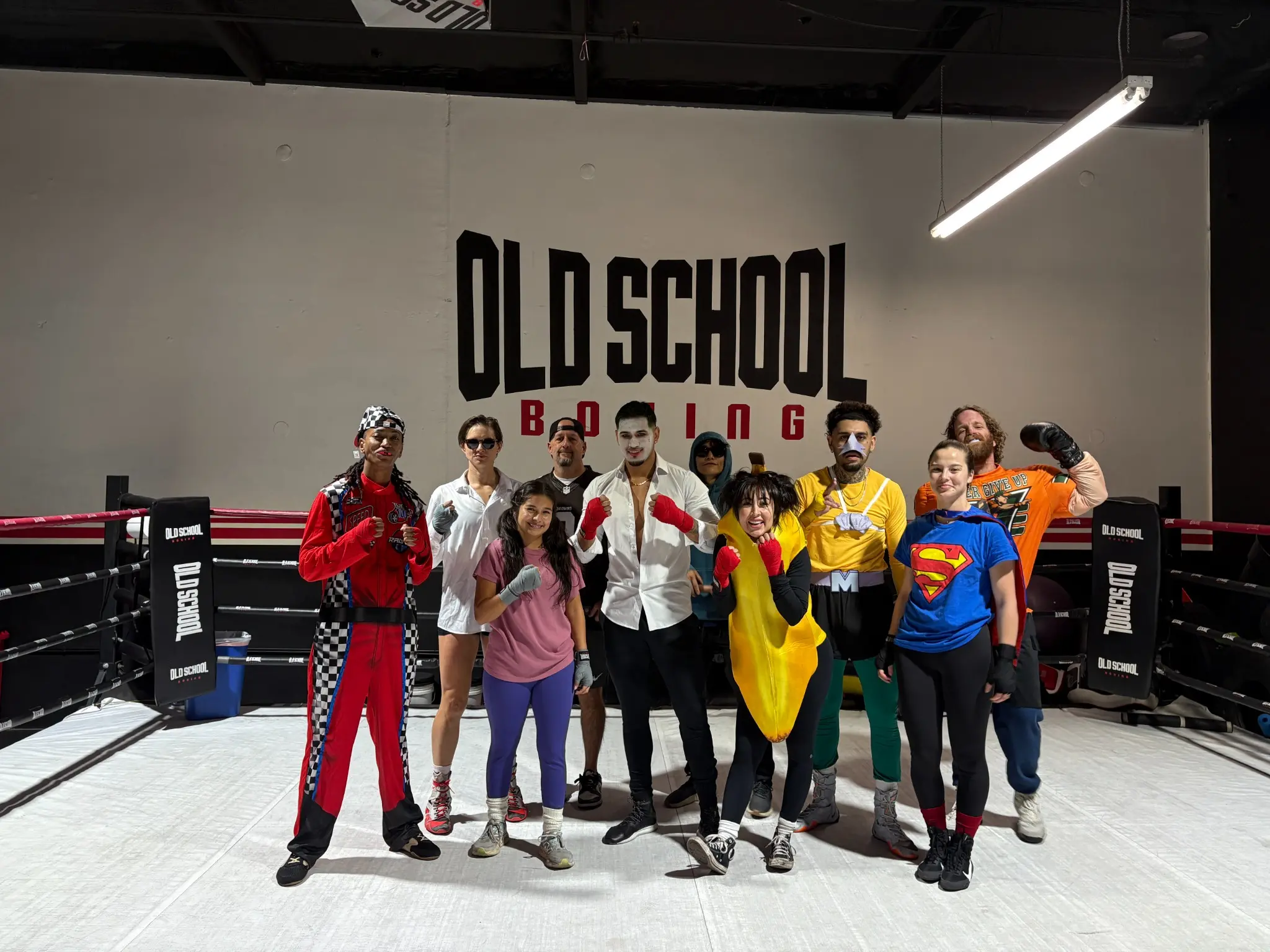 Old School Boxing team and members dressed for Halloween inside the Phoenix boxing gym