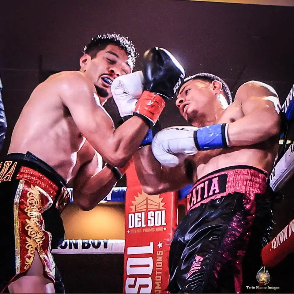 Miguel Ceballos boxing along the ropes