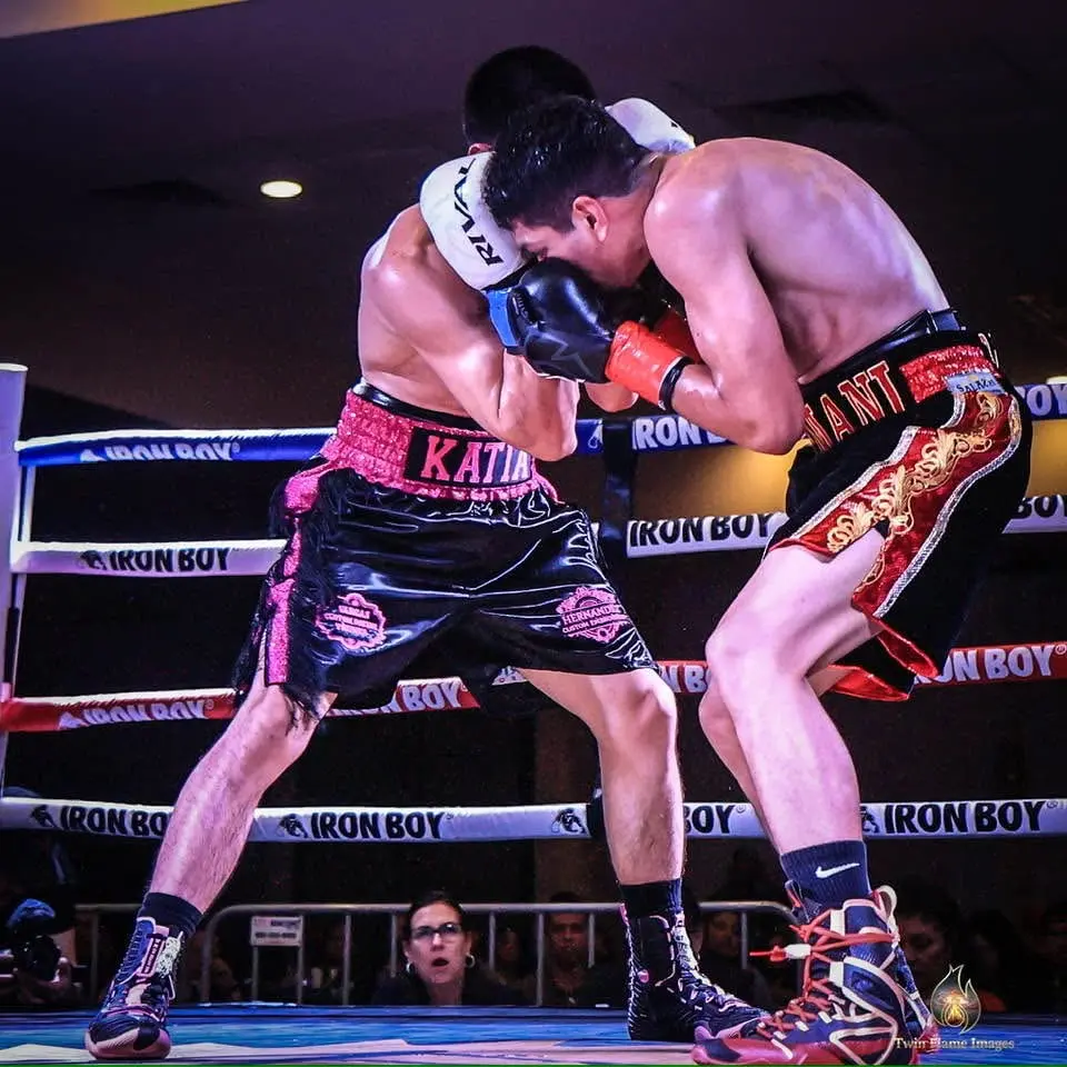 Miguel Ceballos trading punches at center ring