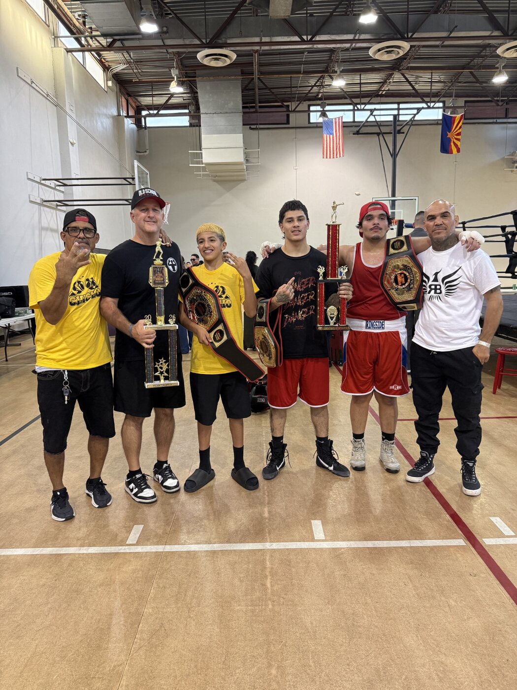 Old School Boxing fighters and coaches celebrating at the Walt Hoskins Showdown