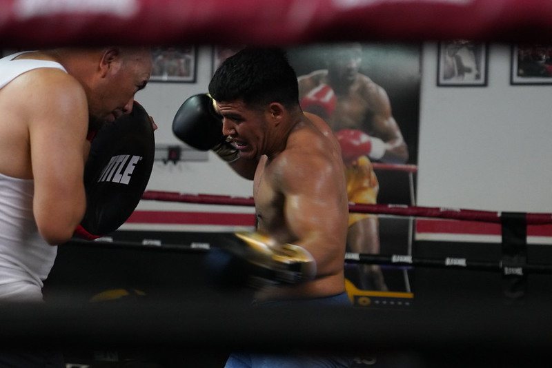 Old School Boxing Club member training on the mitts