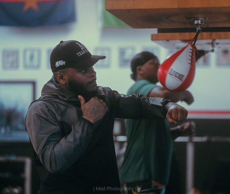 Old School Boxing Club coach working the speed bag