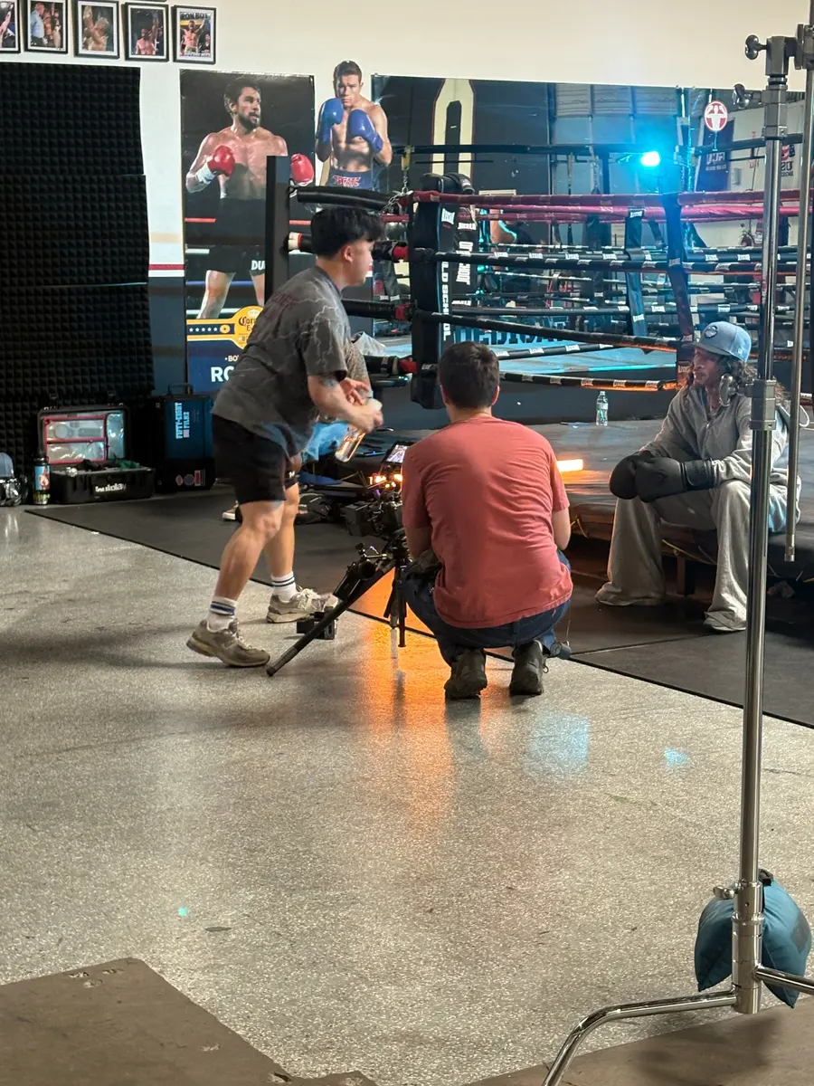Professional video production filming inside the Old School Boxing ring